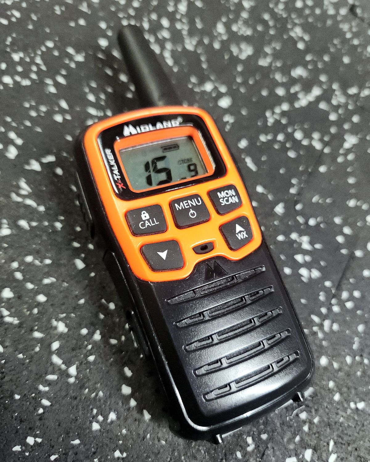 Midland X-Talker FRS handheld radio showing channel 15 on its display